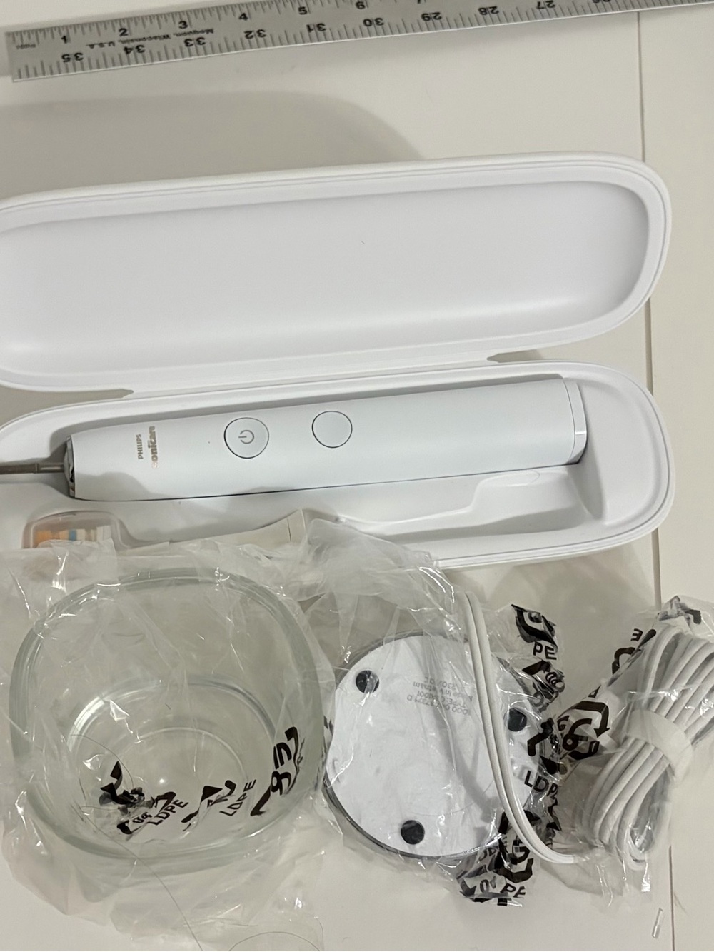 Philips White Electric Toothbrush with Travel Case and Charger